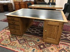 A late Victorian oak partners desk, width 184 cm.