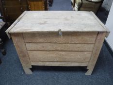 A rustic pine hay bin