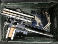 A crate of two heavy duty bench vice and an electric jigsaw
