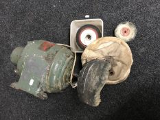 An industrial bench mounted buffer together with a box containing three industrial motors