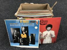 A box of LP records - easy listening and a tribal stick