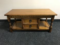 An oak two tier coffee table