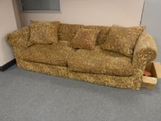 A contemporary settee in a paisley fabric