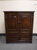 An oak audio cabinet