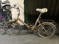 A lady's Hercules folding bike