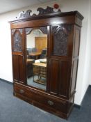 A late Victorian mahogany mirrored door wardrobe CONDITION REPORT: 207cm high,