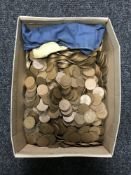 A box of a large quantity of one penny pieces