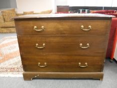 An Edwardian oak three drawer chest