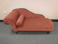 A pink dralon chaise longue
