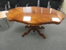 An Italian style pedestal dining table