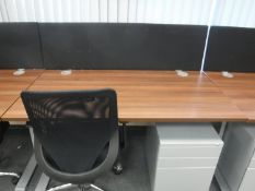 An office desk with back divider,