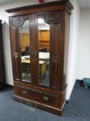 A late Victorian mahogany mirrored door wardrobe CONDITION REPORT: 200cm high,