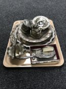 A tray of plated wares including serving tray and basket,