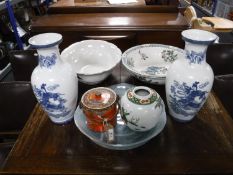 Two Japanese blue and white vases depicting Geisha together with a hand painted Japanese lidded