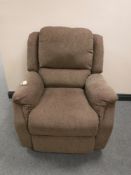 An electric reclining armchair
