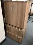 A double drawer office filing chest and a stationary cupboard with keys