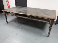 A large Victorian oak writing table,