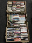 Five boxes of assorted DVD's and CD's