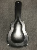 A good quality hard carry case for an acoustic guitar