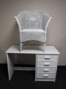 A painted bamboo four drawer dressing table and a loom chair