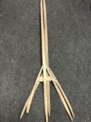 Two rustic hay forks