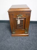 A mahogany coal receiver with liner