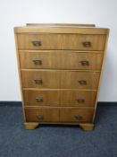 A 20th century walnut five drawer chest