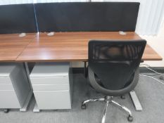 An office desk with back divider,