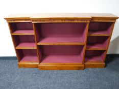 A set of yew wood break-front open shelves