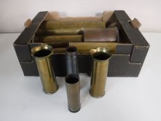 A box of brass and copper ammunitions shells and spent bullet casings