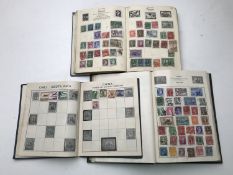 Three mid 20th century stamp albums