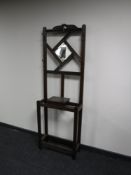 An oak mirrored hall stand