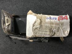 A box of Commodore 64, PC surround sound speakers,