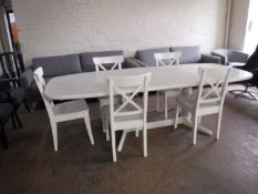 A white extending table with two leaves and five chairs CONDITION REPORT: This is