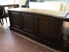 A Victorian mahogany triple door low sideboard