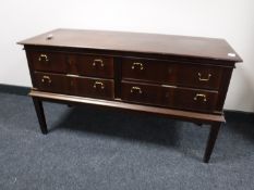 A side by side four drawer chest