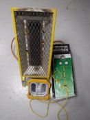 Two 110 volt work lights and boxed halogen spot light on stand