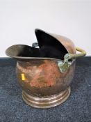 A Victorian copper coal bucket with brass handle
