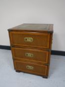 A mahogany three drawers ship's style chest inset leather panel
