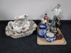 A Doulton Burslem toilet jug and basin, tray of continental figures,