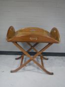 A mahogany butler's tray on stand