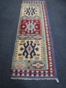 A Turkish kilim runner,
