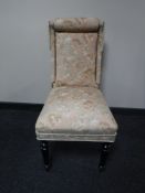 A 20th century upholstered bedroom chair