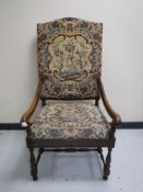 An oak scroll arm gent's armchair