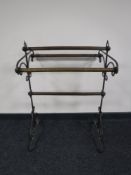 A pine and wrought iron towel rail
