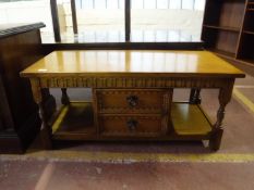 An oak two tier coffee table