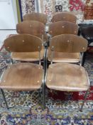 Six mid 20th century tubular metal and teak stacking chairs