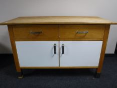 An Ikea kitchen double door cupboard with prep top