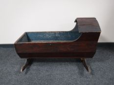 A Victorian pine rocking crib