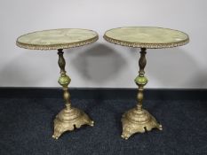 A pair of brass and onyx wine tables